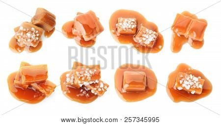Set With Delicious Caramel Candies And Sauce On White Background, Top View
