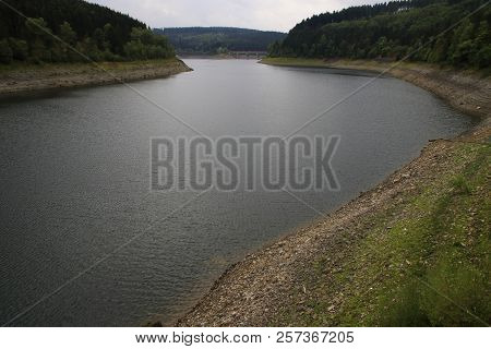 Okerstausee Near Goslar In The Harz.
The Reservoir Has Little Water In The Summer Of 2018 After A Lo