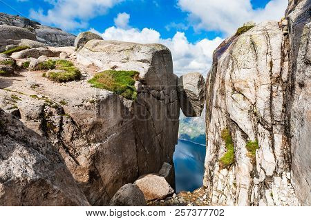 Kjeragbolten - Famous Landmark On Kjerag Mountain, Norway. Summer Landscape