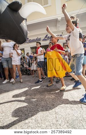 Montijo, Spain - September The 7th, 2018: Running Of The Bulls For Children. Party For Children With