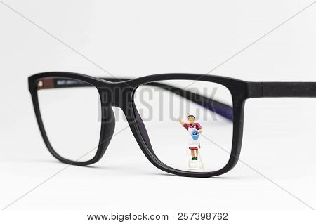 Miniature Woman On A Ladder Cleaning Glasses