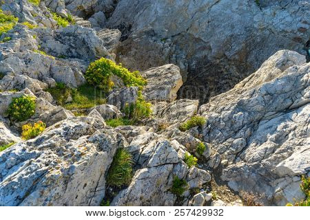 Rocks on the beach. Dramatic view of rocky coastline in Santander, Spain.