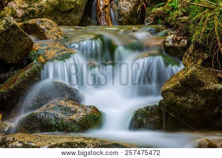 Small watrfall on mountain stream
