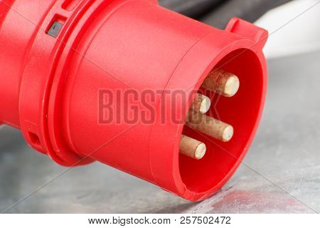 Closeup Of Industrial Electric Plug Of Machinery With Cable, Technology And Engineering Concept