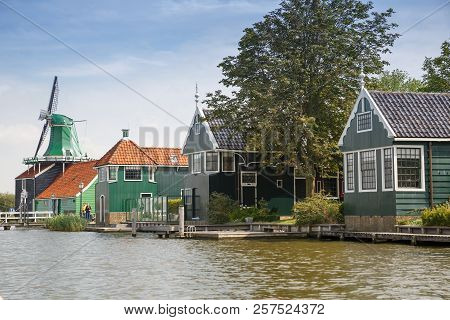 Zaanse Schans, Netherlands, August 19, 2015 - Traditional, Authentic Dutch Houses And Windmill At Th