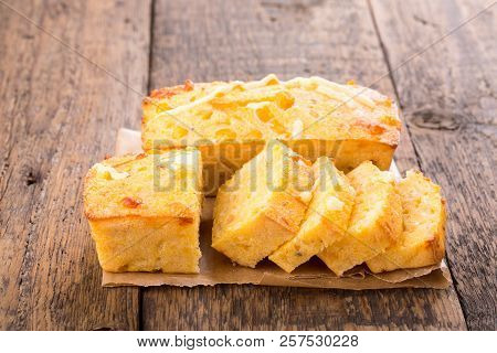 Freshly Baked Corn Bread On Wooden Background.