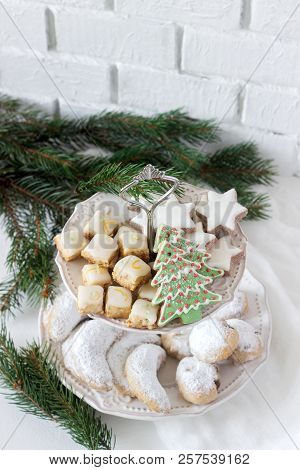 Festive Cookies Assorted Vanilla Crescents, Cinnamon Stars, Gingerbreads And Cubes And Stollen On A 
