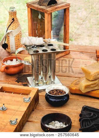 Old Fashioned Household Items In Markitant Tent, Set For Candle And Soap Making. Historical Reconstr
