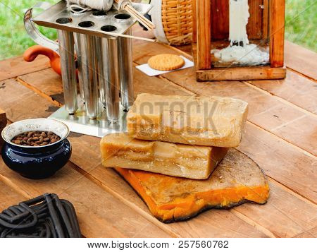 Old Fashioned Household Items In Markitant Tent, Set For Candle And Soap Making. Historical Reconstr