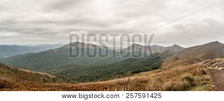 Spectacular Panorama Of Wild Bieszczady Mountains With Many Hills Covered By Mountain Meadows And De