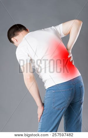 Back Pain, Kidney Inflammation, Man Suffering From Backache, Painful Area Highlighted In Red