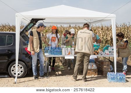 Tovarnik, Croatia - September 19, 2015: Workers Of The Ngo World Vision Provinding Aid To Refugees A