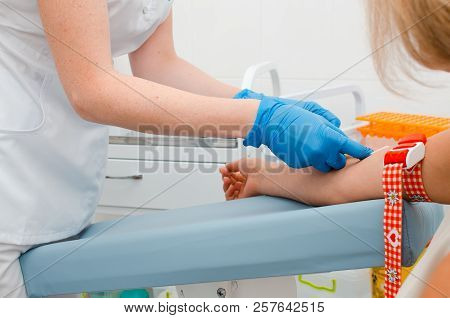 The Doctor Takes A Blood Test. The Concept Of Hiv Testing