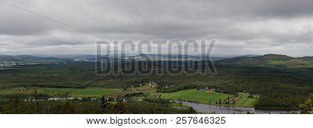 Finland, Views From The Top Of Aavasaksa Mountain With Houses, Forest And Mountains And The River On