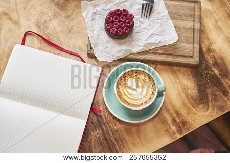 Breakfast Time With Cup Of Fresh Coffee From Above On Wooden Background, Sweet Strawberry Cake On Wo