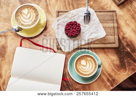 Breakfast Time With Two Cups Of Fresh Coffee From Above On Wooden Background, Sweet Strawberry Cake 