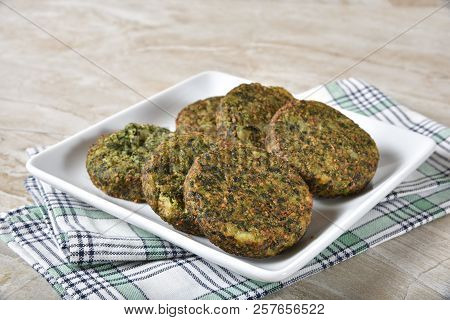 Spinach Cakes Made With Spinach, Potatoes, Onions, And Spices