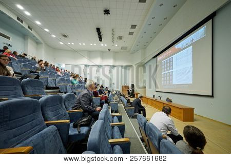 MOSCOW, RUSSIA - FEB 2, 2018: People listen to head of department of roentgenology of Pirogov Center O.Bronov during Surgical Treatment of Epilepsy conference in Russian Children Clinical Hospital.