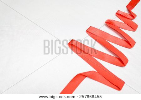 Christmas And New Year Tree Made From Red Ribbon On Silverbackground Free Space For Text - Holidays,
