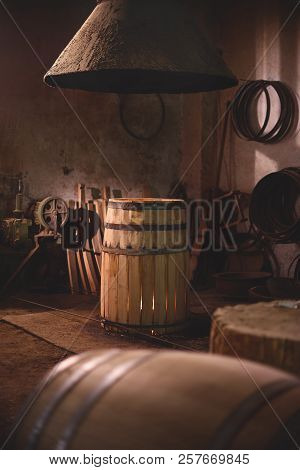Flames Burning In Oak Barrels For Firing Its Inner Side In The Cooper's Workshop