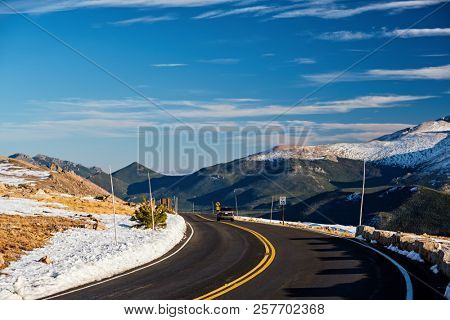 Trail Ridge Road, the highest (12,183 feet) continuous highway in the USA in high alpine tundra with rocks and mountains at autumn. Rocky Mountain National Park in Colorado, USA. 