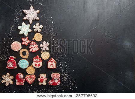 Overhead Of Christmas New Year Holiday Background. Greeting Card With Gingerbread Cookies In Shape F