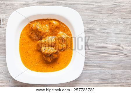 Indian Cuisine - Murg Makhan Masala Barbequed Chicken Pieces In Spicy Tomato And Creamy Curry Sauce 