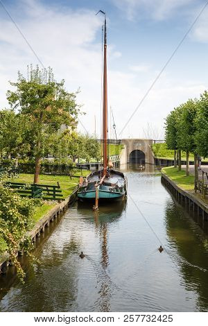 The Boat At The Canal In The Traditional Old Fisherman Village Open-air Museum Of Zuiderzee (zuiderz