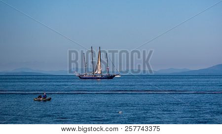 The Movement Of Ships In The Amur Bay Of The Bosporus Vostochny Strait In The Background Of The Russ
