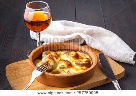 Georgian Cuisine: Close Up Mushrooms Baked With Cheese Suluguni On Ketsi