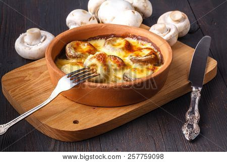 Georgian Cuisine: Close Up Mushrooms Baked With Cheese Suluguni On Ketsi