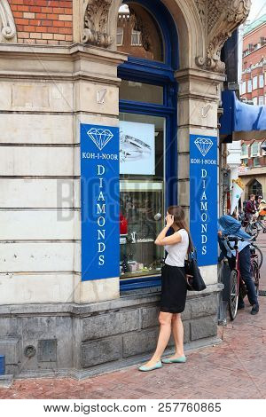 Amsterdam, Netherlands - July 8, 2017: Tourist Visits Diamond Factory Shop Koh-i-noor In Amsterdam, 
