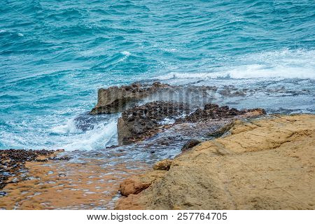 Saaidia Island And Waves And Rocks
