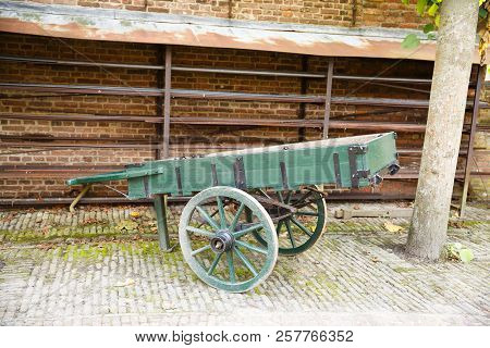 The House And Old Wooden Cart In The Traditional Old Fisherman Village Open-air Museum Of Zuiderzee 