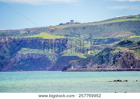 Saaidia Island And Waves And Rocks