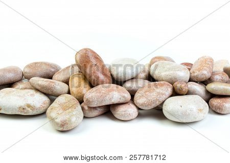 Small Sea Stones, Isolated On White. Top View With Copy Space