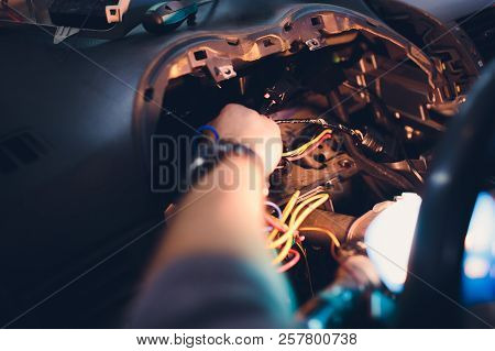 Repairs Keychain Car Security System. Installation In Car