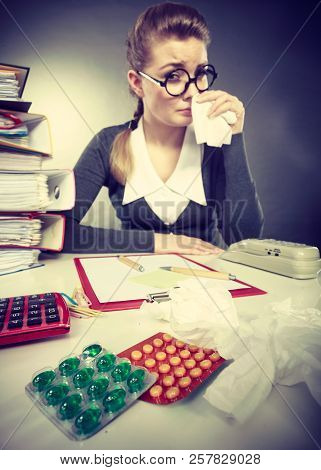 Sickness And Diseases At Work. Young Unhealthy Businesswoman With Tissue Having Flu Grippe. Secretar