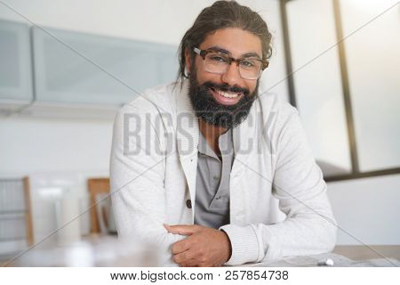 Portrait of bearded man with eyglasses