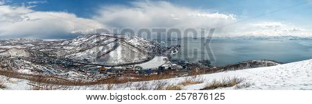 View From Above To The City Of Petropavlovsk-kamchatsky And Avchinskaya Bay In Winter In Sunny Weath