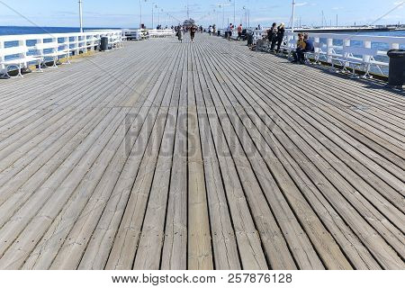 Sopot, Poland - June 6, 2018: Wooden Sopot Pier In Sunny Day. It Is The Longest Wooden Pier In Europ
