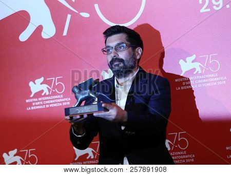 Mahmut Fazil Coskun poses with the Special Orizzonti Jury Prize for  Anons at the Winners Photocall during the 75th Venice Film Festival at Sala Grande on September 8, 2018 in Venice, Italy. 
