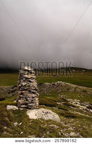 Landscape Of Mavrovo National Park With Mountain And Stone Pyramid In Fyr Macedonia
