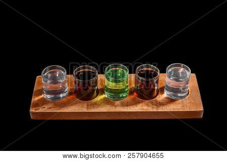 Multicolored Transparent Cocktails, A Set Of Shots In One Row, Five Servings On A Wooden Stand, Subs