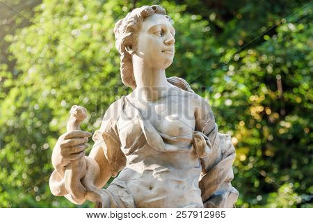 Sandstone Statues In The Saxon Garden, Warsaw, Poland. Made Before 1745 By Anonymous Warsaw Sculptor