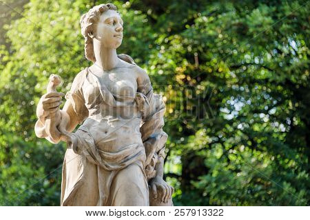Sandstone Statues In The Saxon Garden, Warsaw, Poland. Made Before 1745 By Anonymous Warsaw Sculptor