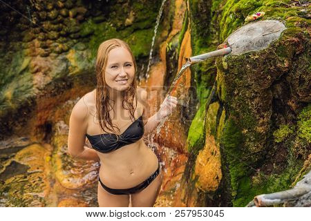 Young Woman Tourist In Belulang Hot Springs In Bali, Village Mengesta, Penebel District, Tabanan Reg