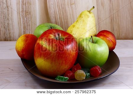 Beautifully Laid Out Fresh Summer Fruits On A Background Of Cutting Boards