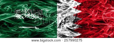 Saudi Arabia Vs Bahrain Smoke Flags Placed Side By Side. Thick Colored Silky Smoke Flags Of Saudi Ar