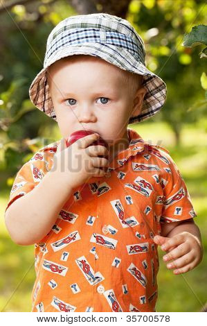 Charming Babe Eating A Red Apple